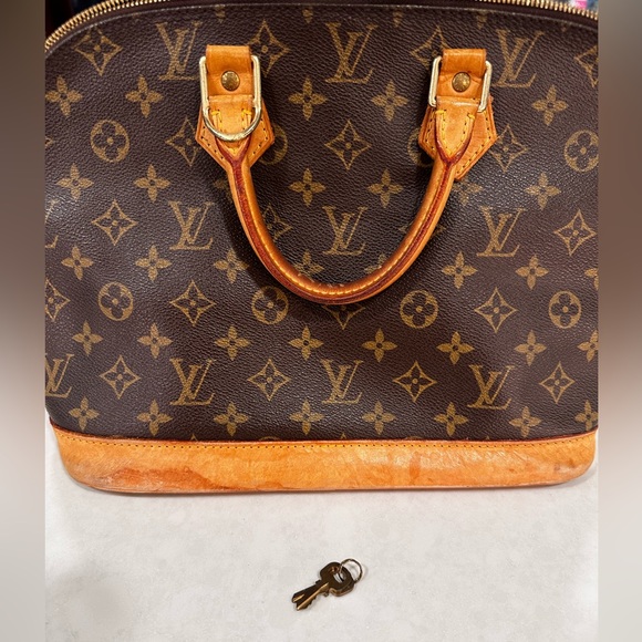Louis Vuitton Alma PM Handbag - Picture 11 of 11